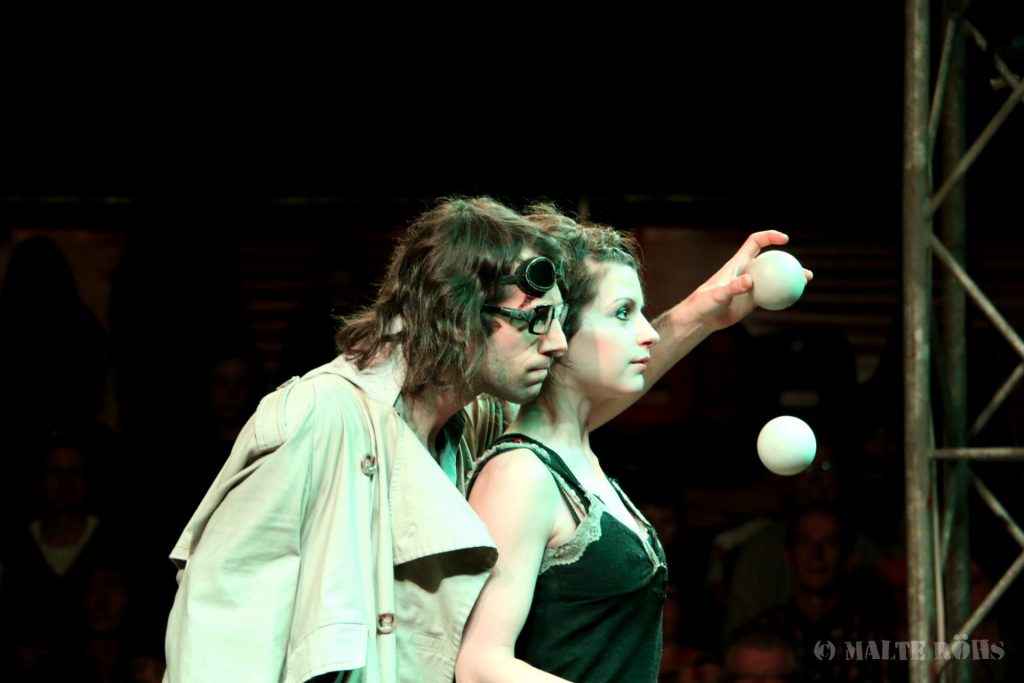Duo during a juggling performance in a show of circus EigenArt