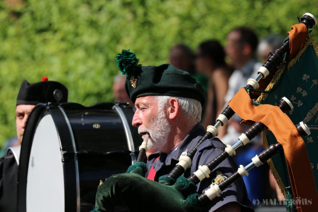 Man playing a bagpipe during the Carnival der Kulturen 2015 in Bielefeld