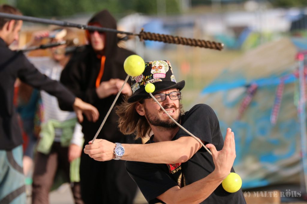 Poi player during the European Juggling Convention (EJC) 2016 in Almere, Netherlands
