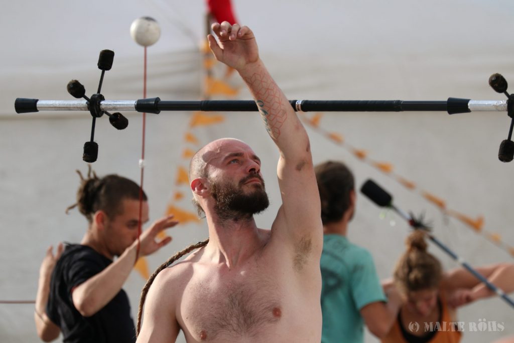 Man playing a dragon staff during the European Juggling Convention (EJC) 2016 in Almere, Netherlands