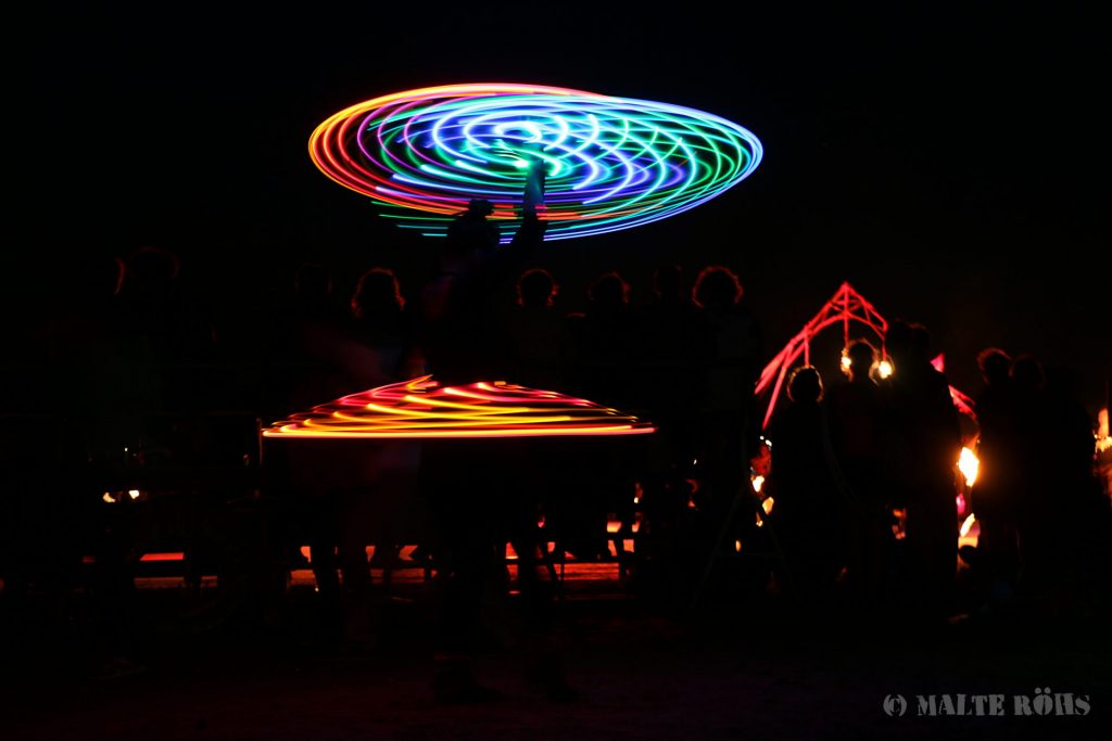 Betty playing an LED hula hoop during the European Juggling Convention (EJC) 2016 in Almere, Netherlands